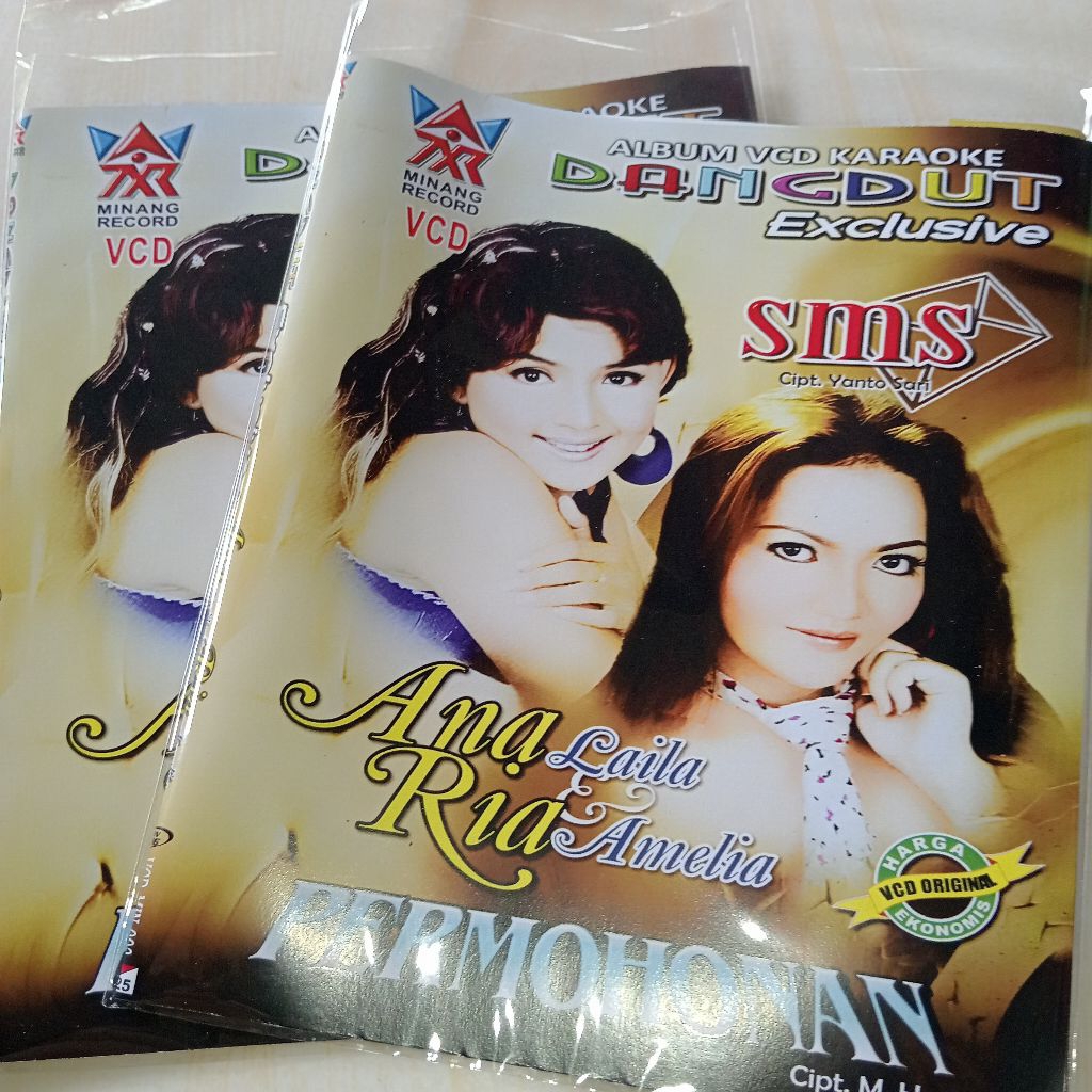 VCD RIA AMELIA ANA LAILA SMS PERMOHONAN (VCD KARAOKE DANGDUT MINANG) [MIN-003]