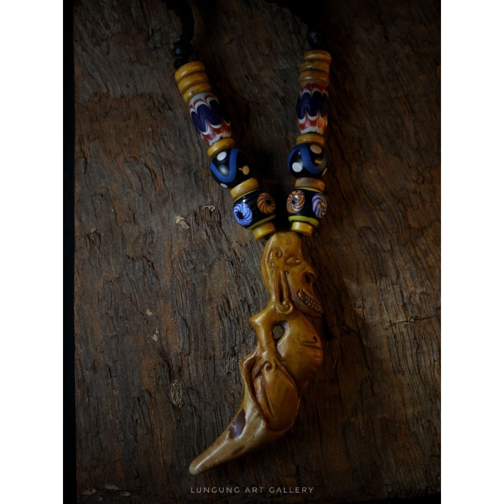 AKSESORIS KALUNG TARBER UKIRAN DAYAK TOTEM
