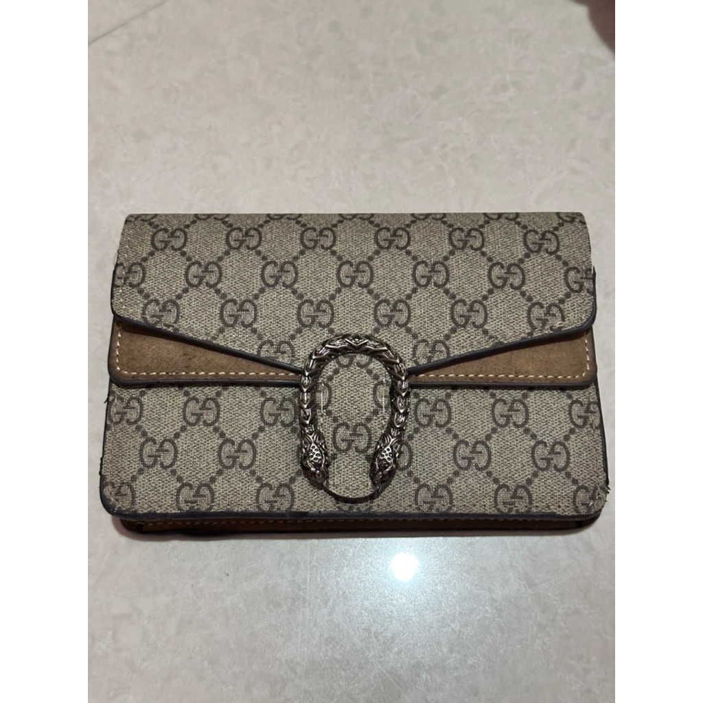 gu*** dionysus mini nano red brown