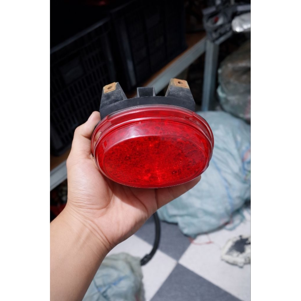 replektor lampu belakang x ride 125 original copotan