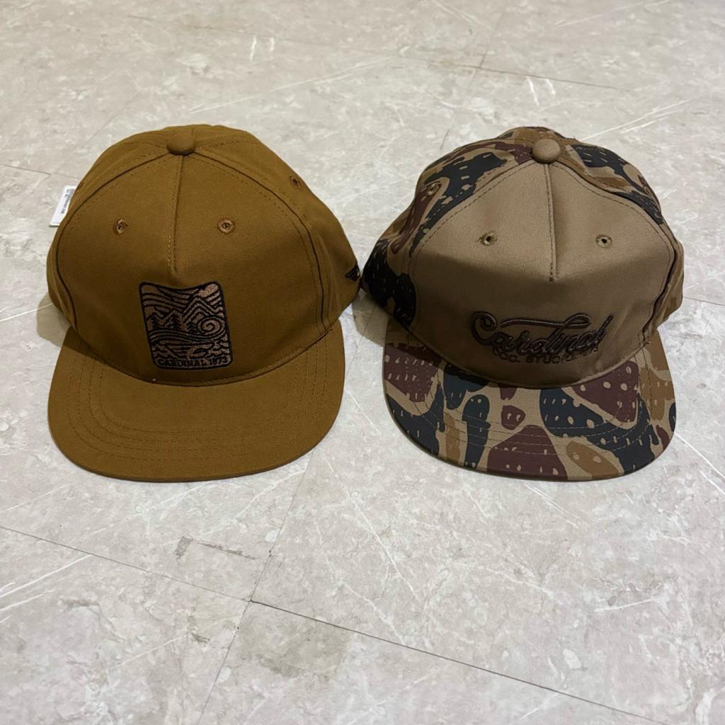 topi cardinal pria original New Series