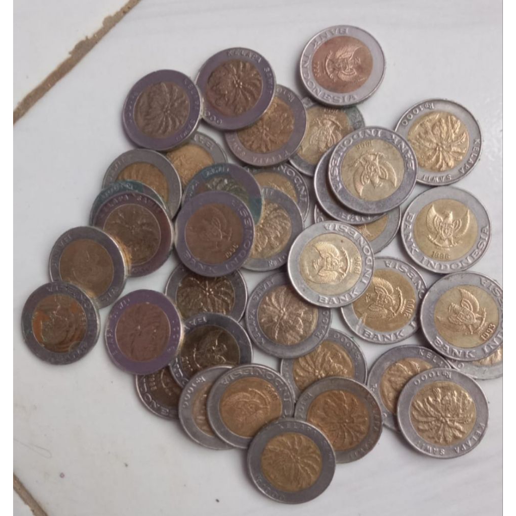 barang kuno uang 1000 kelapa sawit