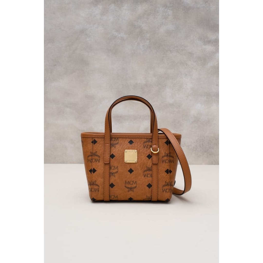 MCM Toni visetos X-mini tote bag
Cognac
