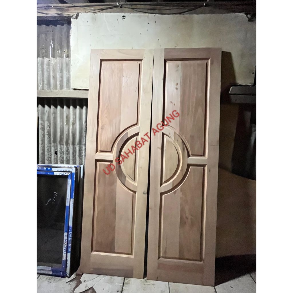 DAUN PINTU KUPU2 DABEL BAHAN KAYU KAMPER DAN MERANTI FULL OVEN BISA CUSTOM UKURAN FEST RESPON