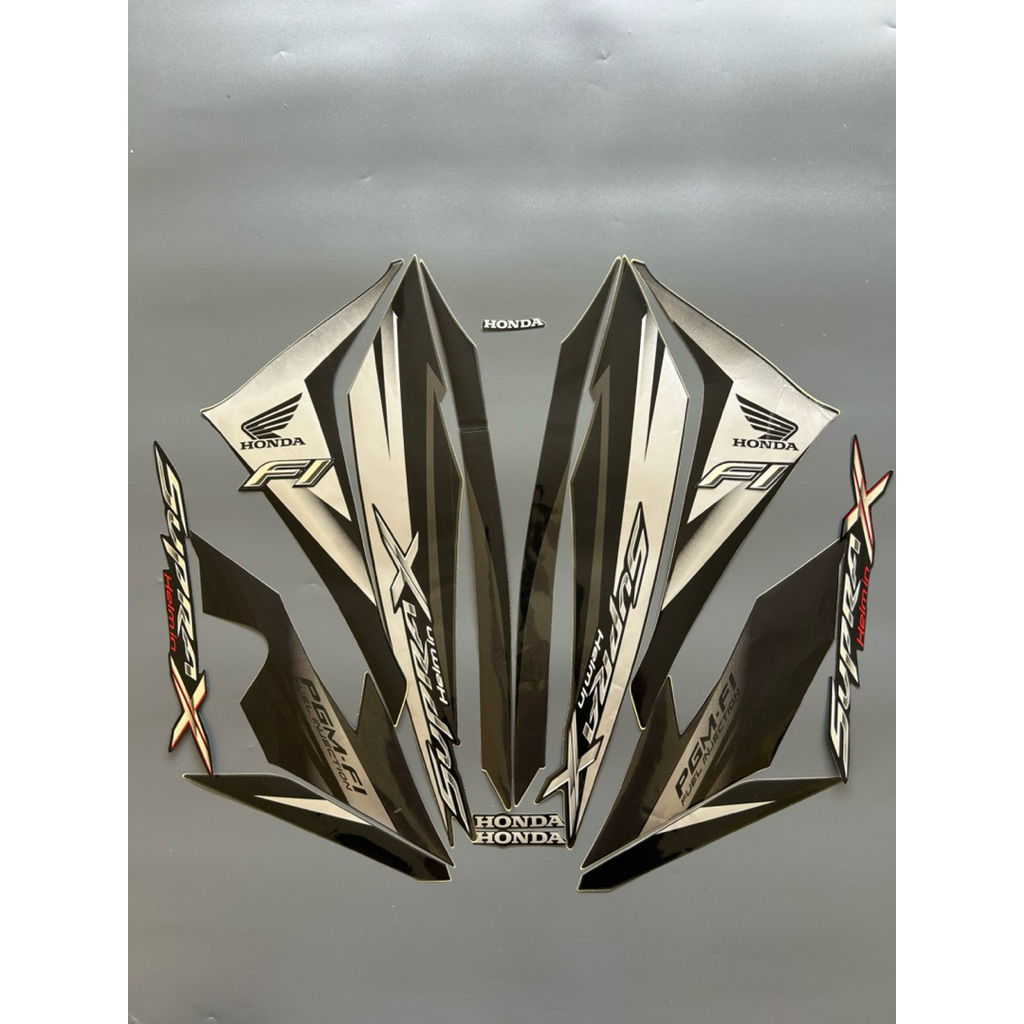 STRIPING STIKER SUPRA X 125 HELM IN FI 2013 HITAM SILVER