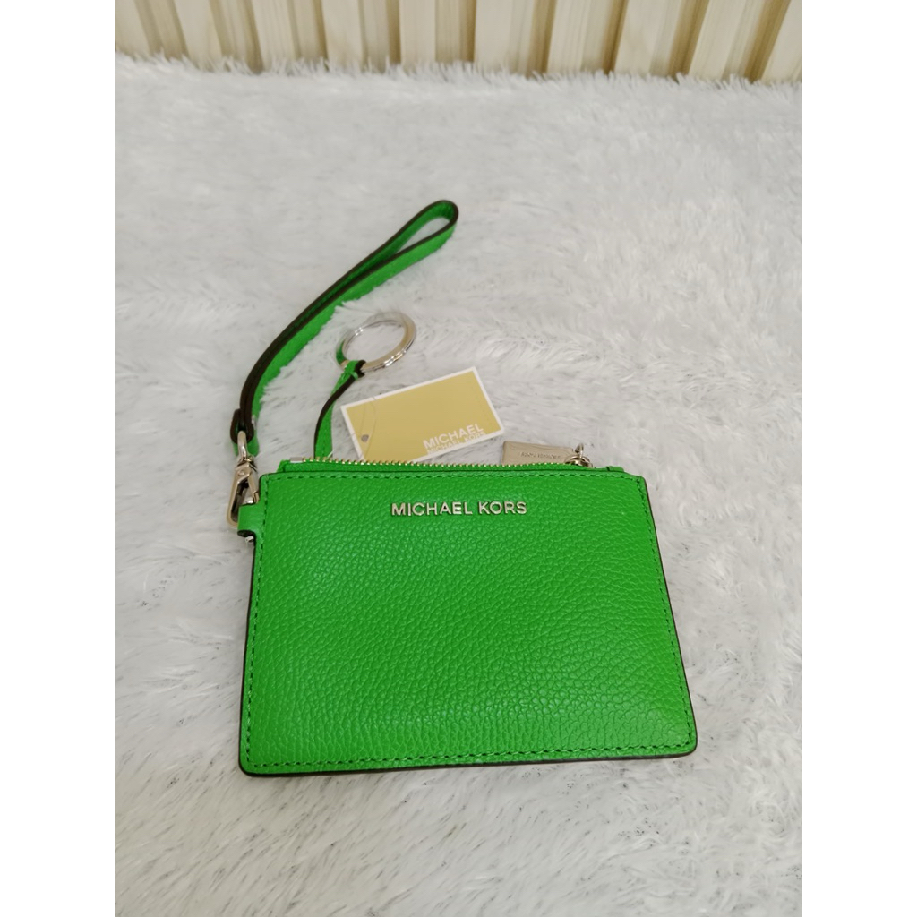 dompet genggam (wristlet) dari Michael kors