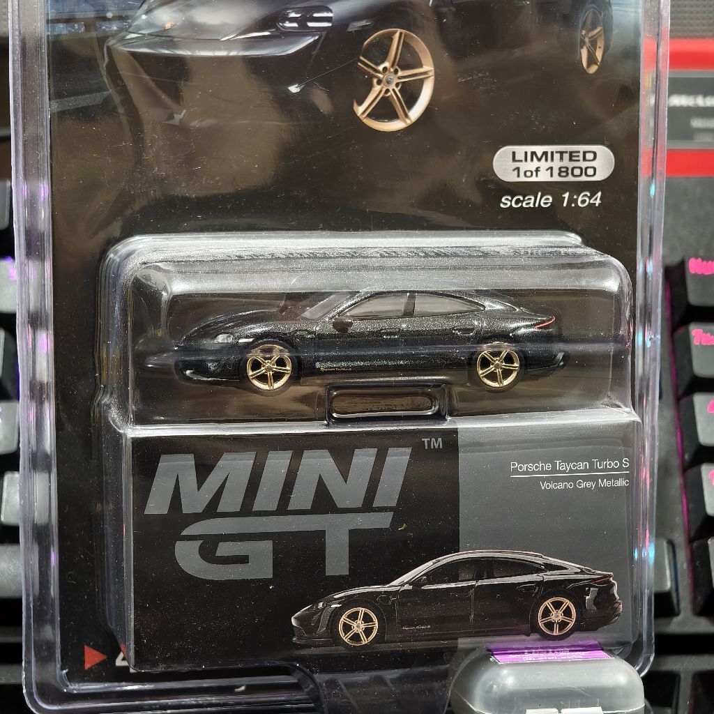 Blister Mini GT Porsche Taycan Grey diecast 1/64