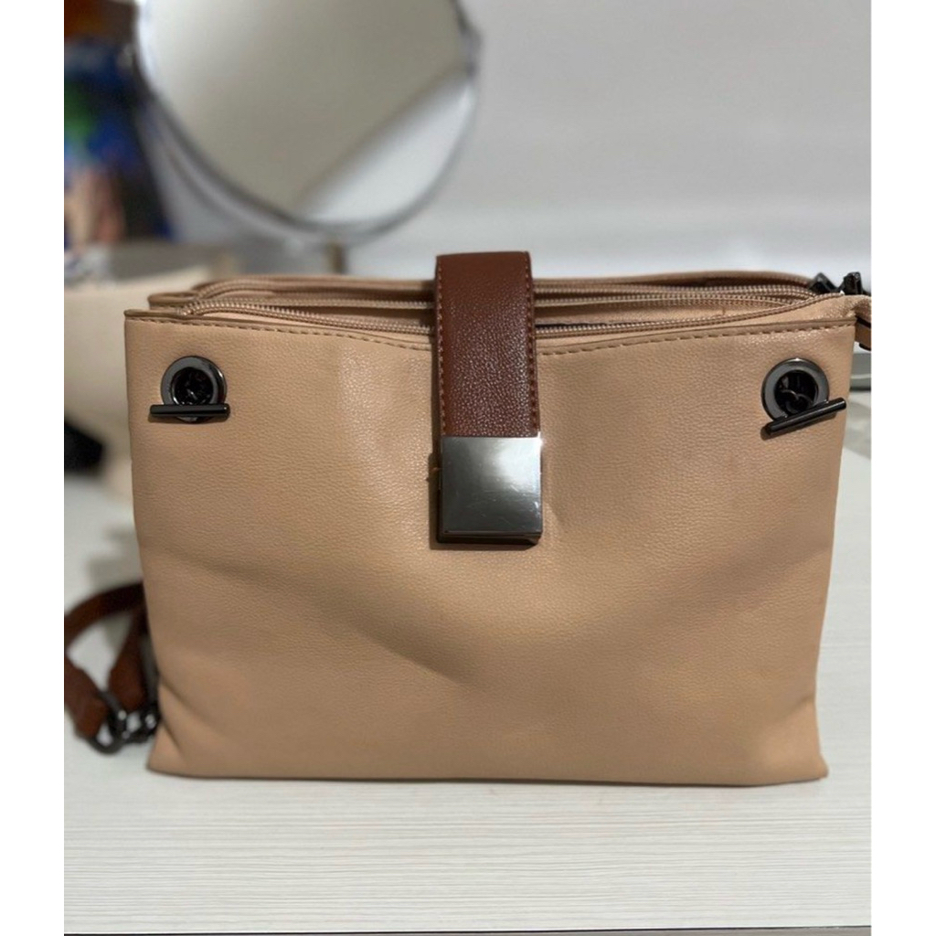 tas elizabeth ori. tas emsio by elizabeth ori