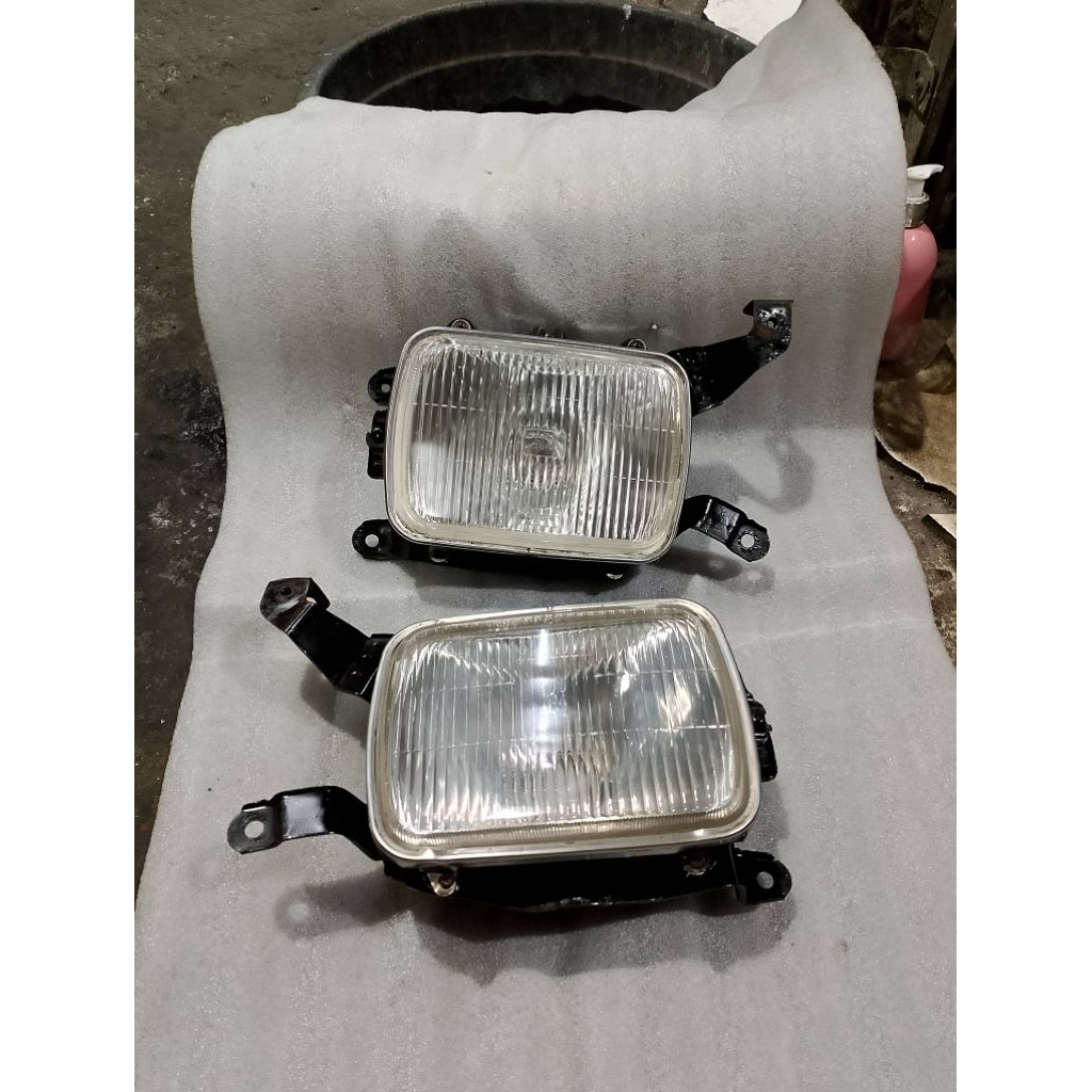 brecket headlamp celong kijang kapsul tahun 2000-2001-2002 original copotan