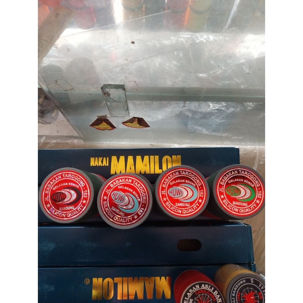gelasan huwi merah label premium