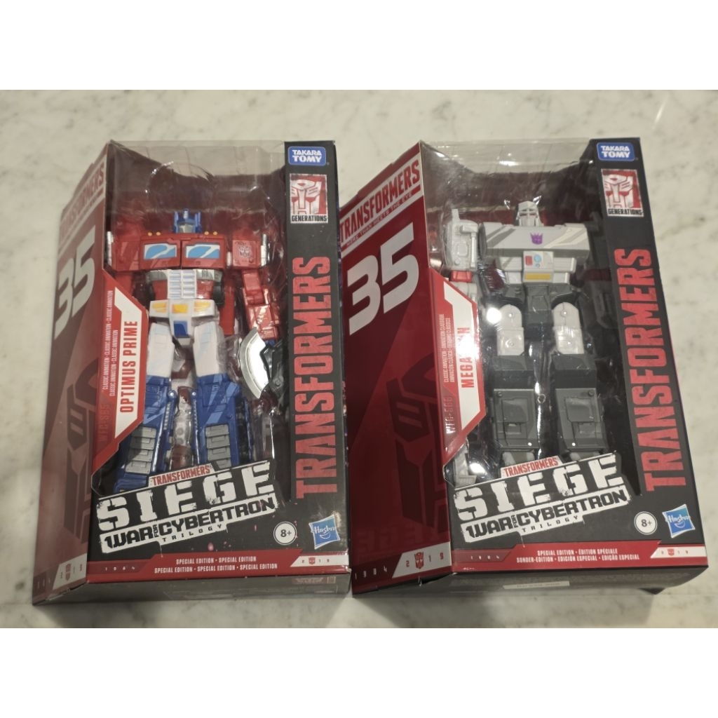 Transformers 35th Anniversary SE Siege Voyager Optimus Megatron Set
