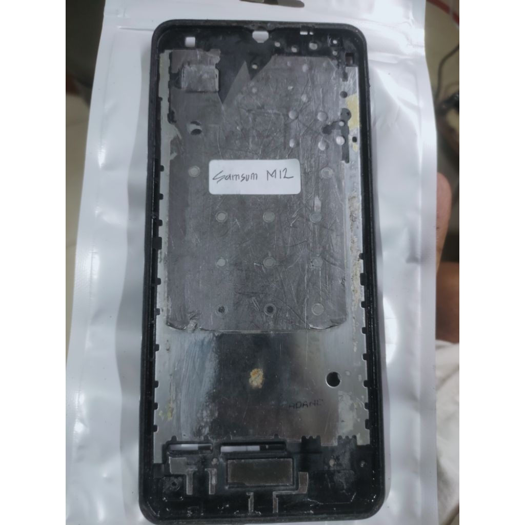 TATAKAN MESIN (MIDLE) SAMSUNG M12 ORI COPOTAN