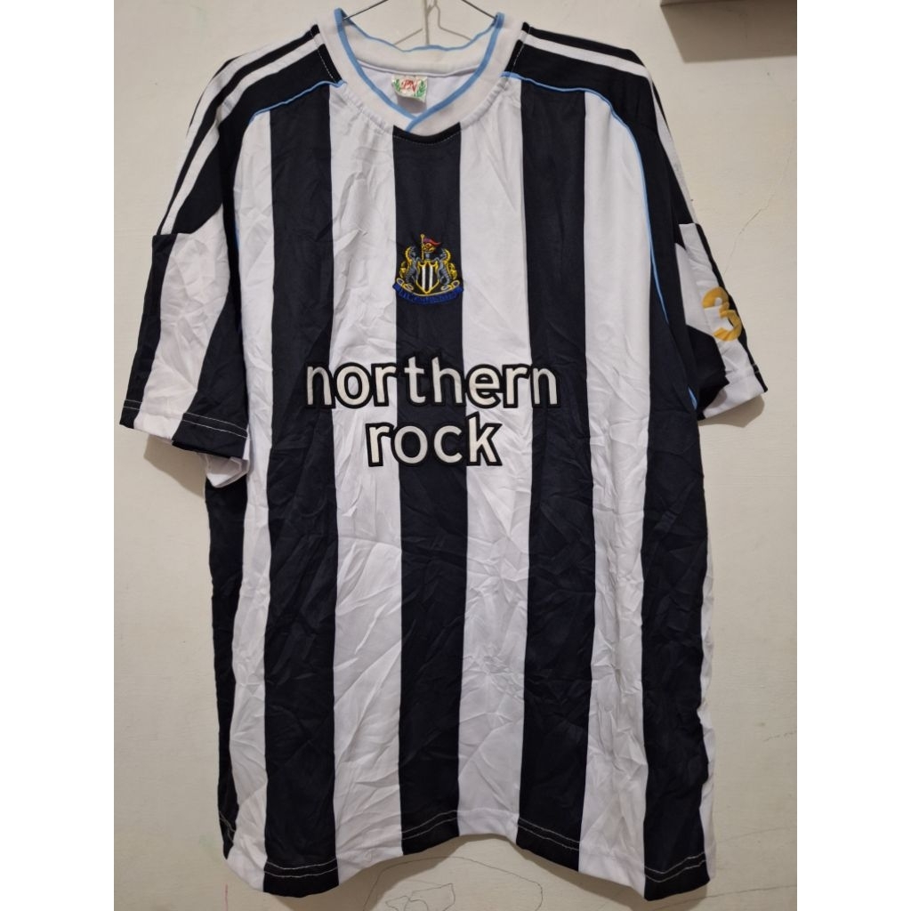 Baju jersey bola Newcastle United