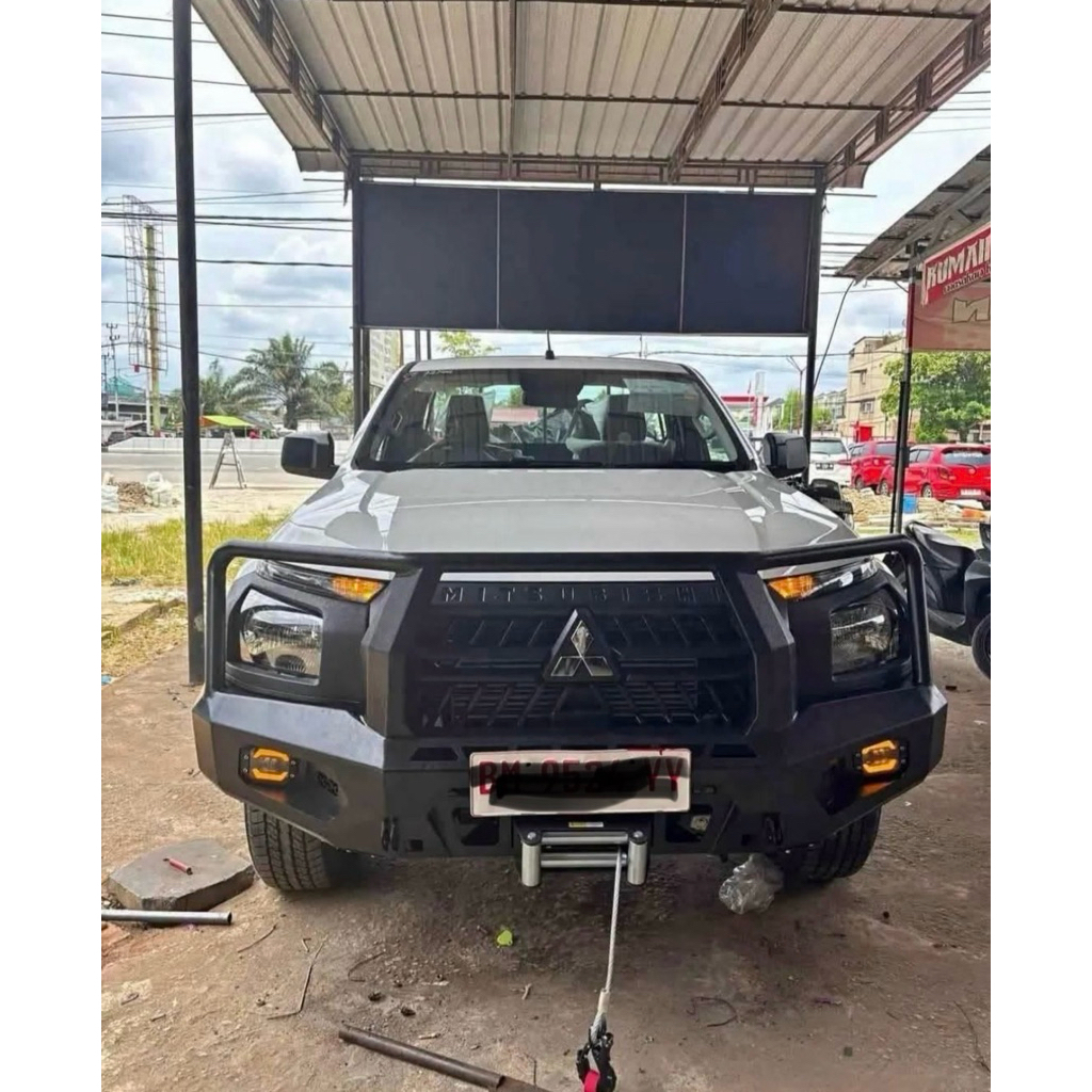 Bumper depan triton 2025