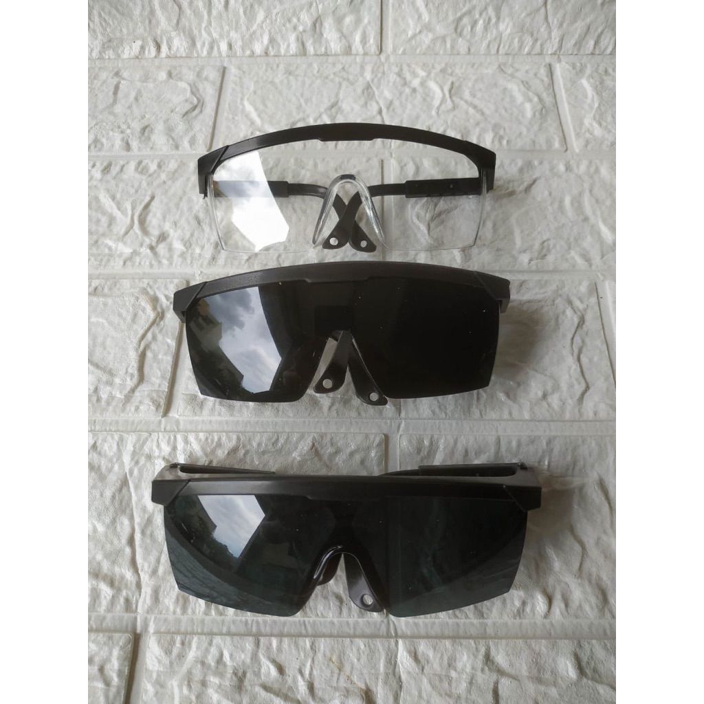 Kacamata safety proyek hitam transparant bening