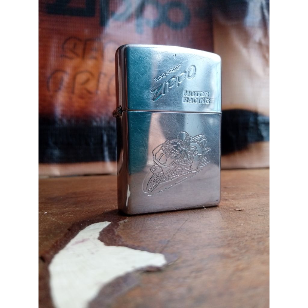original Zippo motto racing mulus romawi tahun 2.000