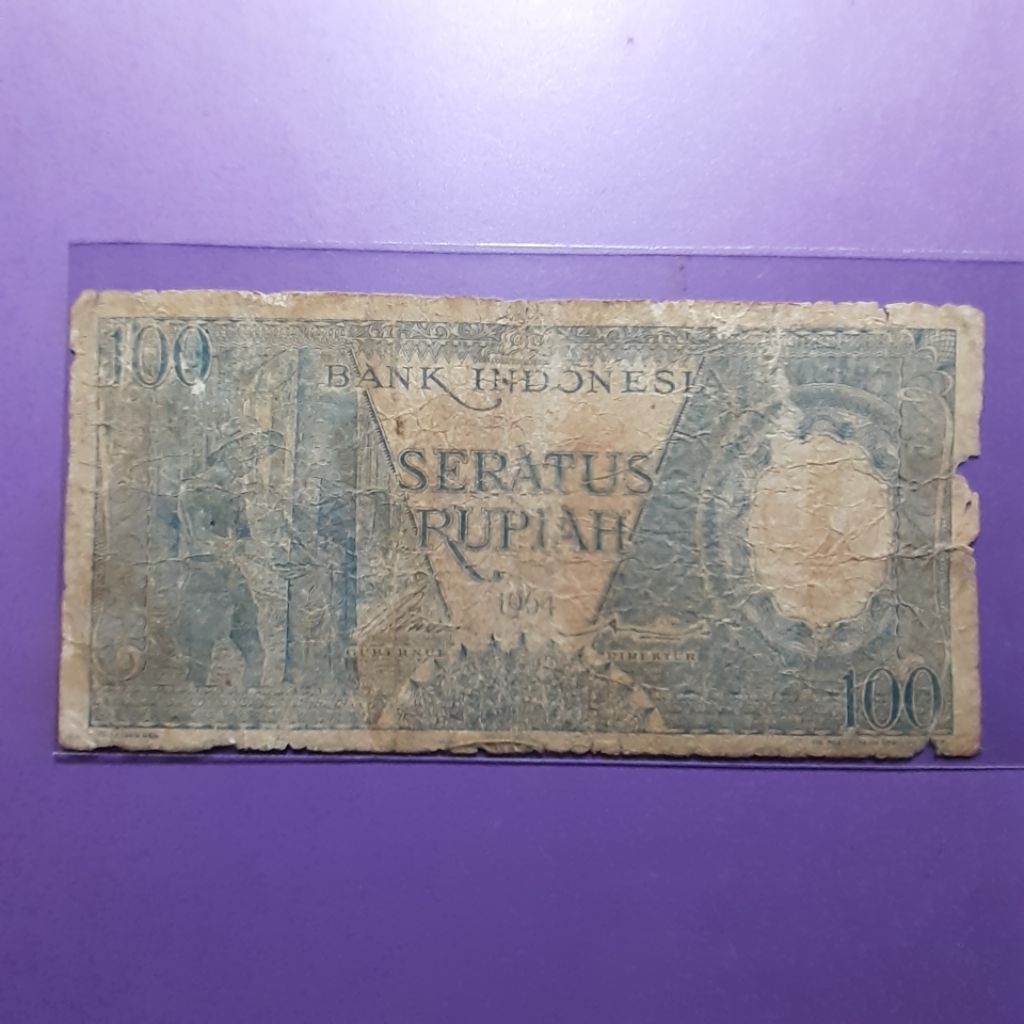 Uang 100 pekerja 1964 biru