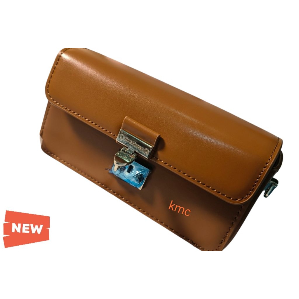 new mini bag or pouch or mini sling bag Brown from Jim Honey