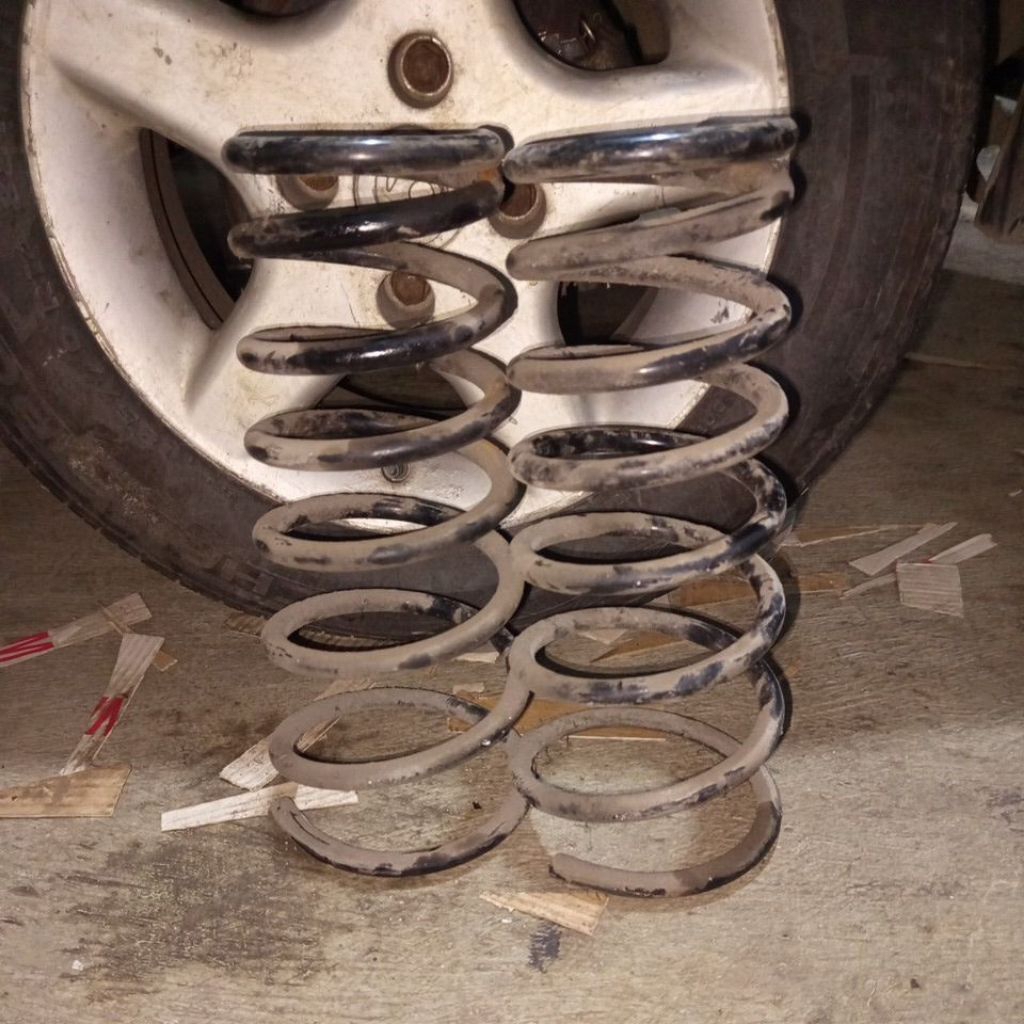 per spiral KIA Carens 1 belakang