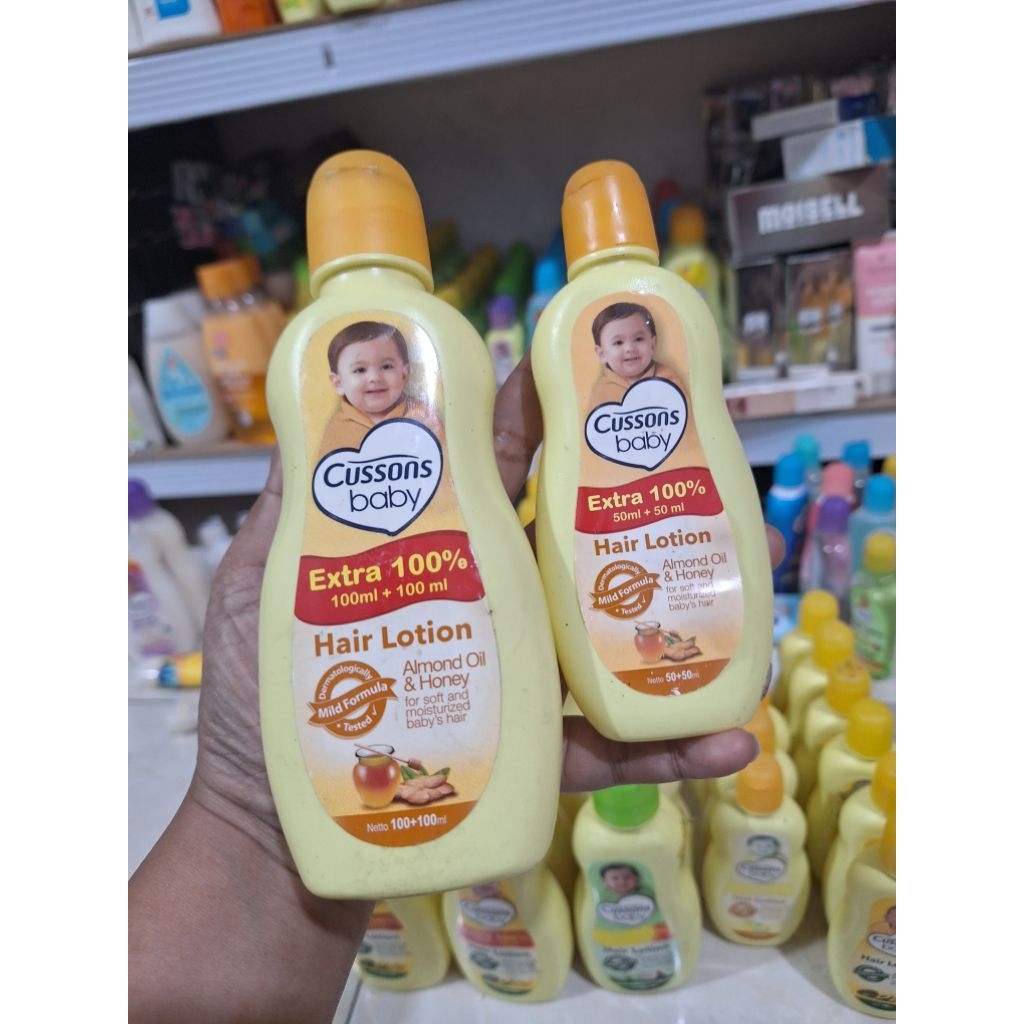Cussons Baby Hair Lotion Almond Oil & Honey kemasan ekstra 100ml + 100ml.