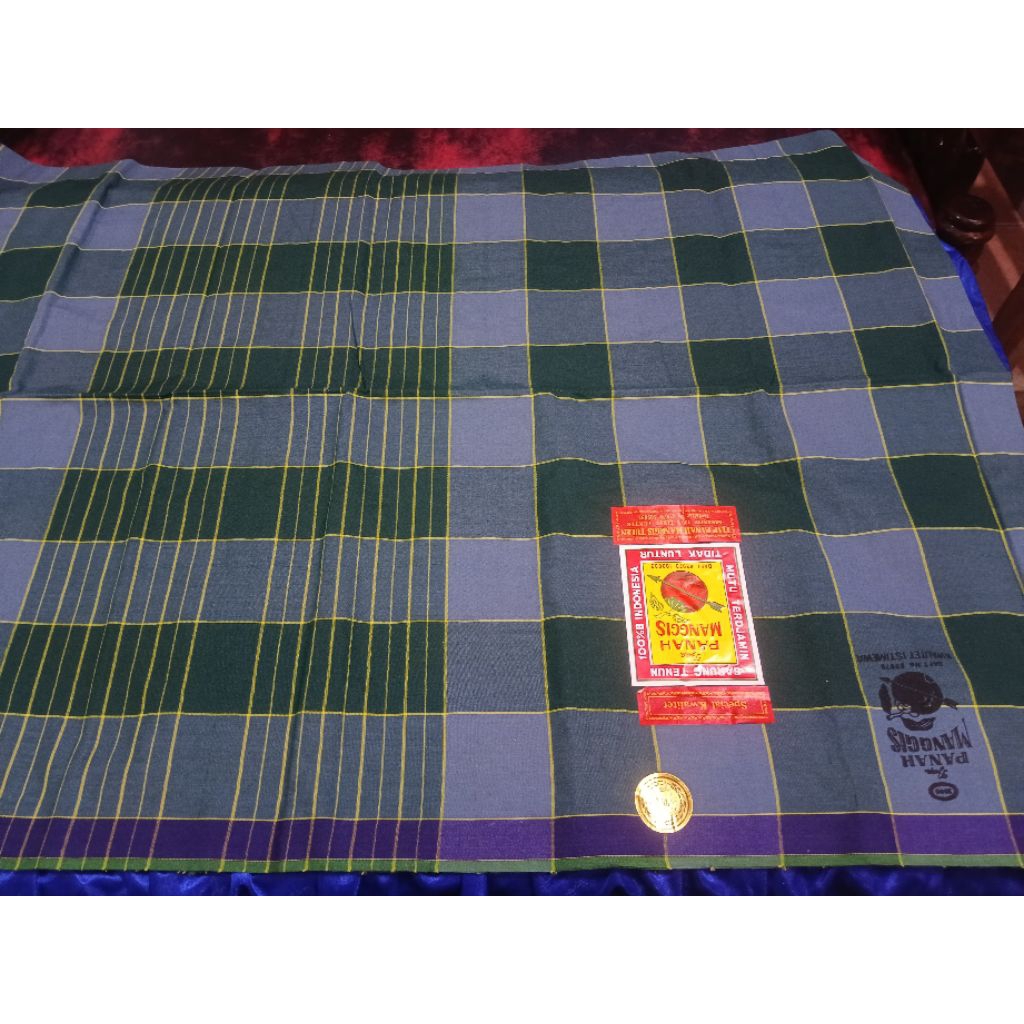 sarung jadoel merk panah manggis