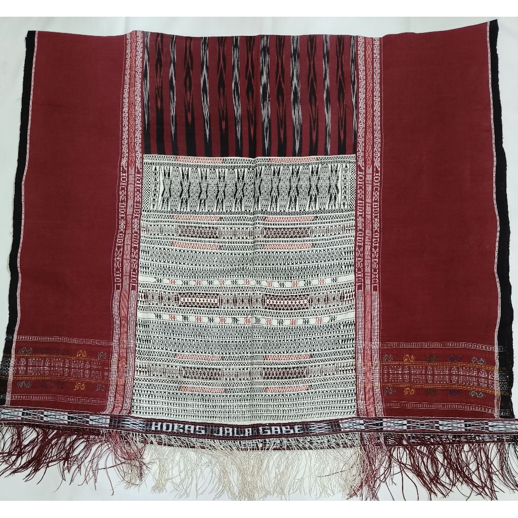 Ulos ragi hidup/pinuncaan pakaian adat Batak toba