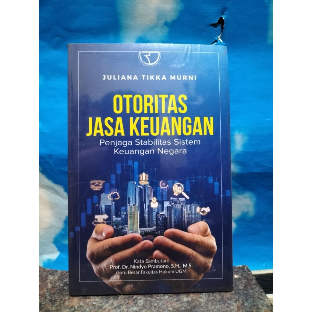 BUKU BARU OTORITAS JASA KEUANGAN PENJAGA STABILITAS SISTEM KEUANGAN NWGARA  OLEH JULIANA TIKKA MURNI