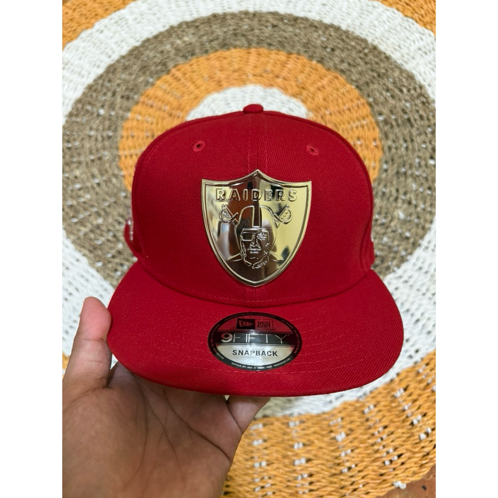 Topi New Era X Raiders Metal Logo 60th Anniversary