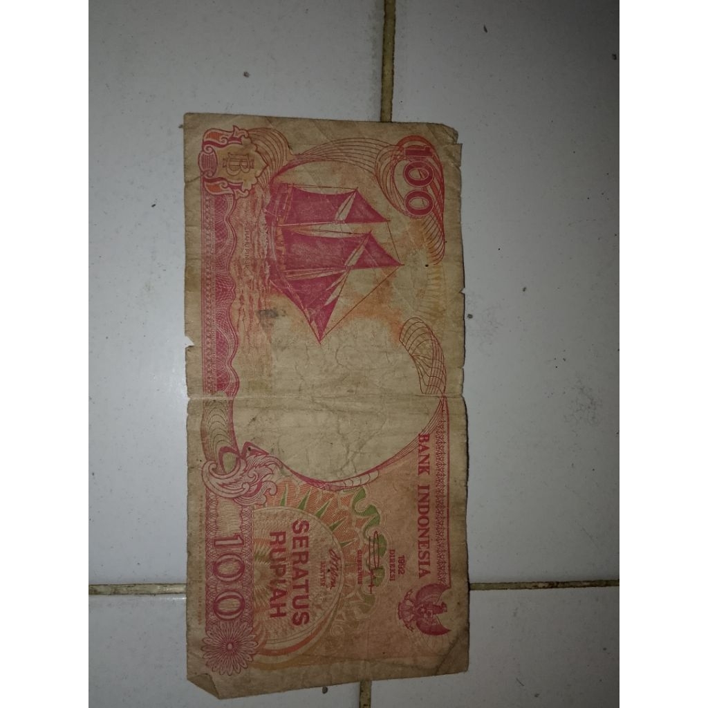 uang 100 Rupiah kertas