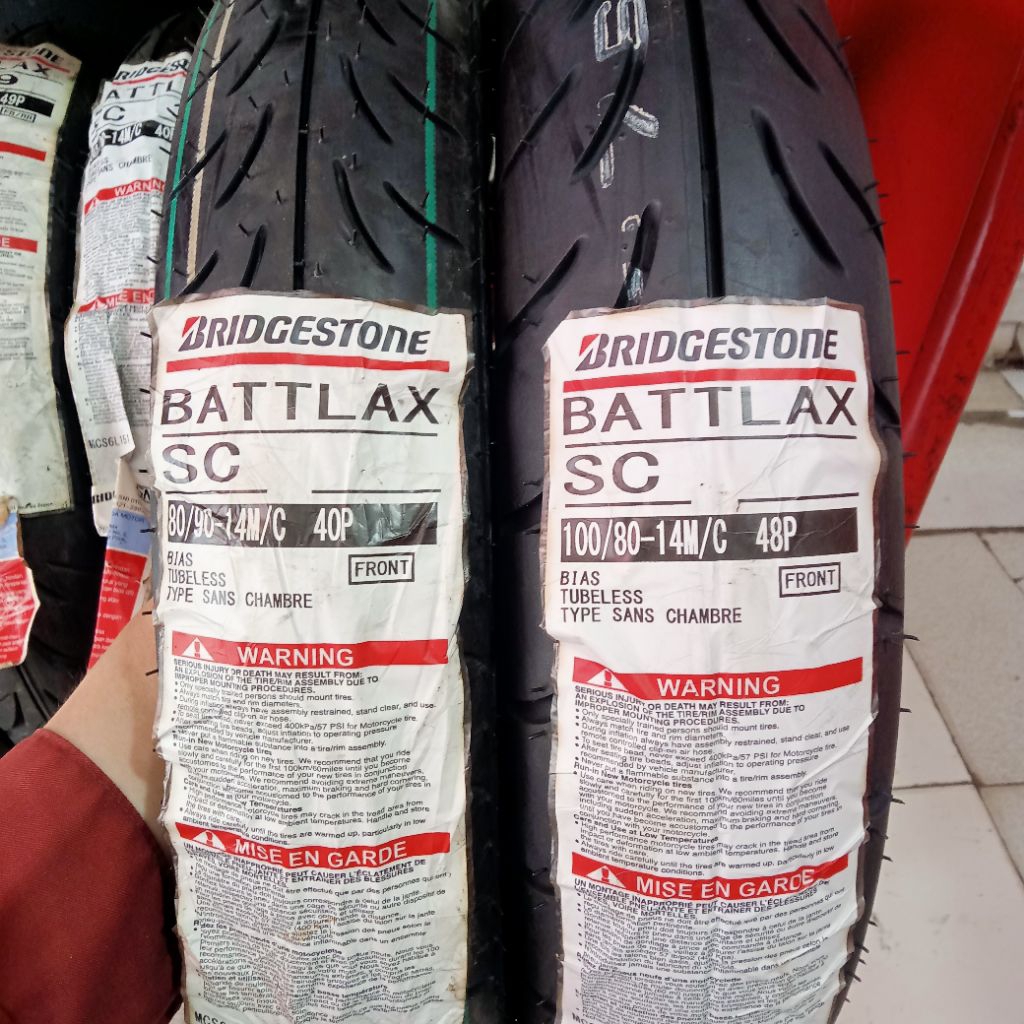 PAKETAN BAN LUAR BATTLAX BRIDGESTONE SC UK 80/90-14 DAN 100/80-14 TUBELESS