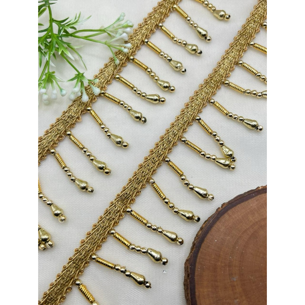 Variasi renda juntai rumbai baju bodo gold