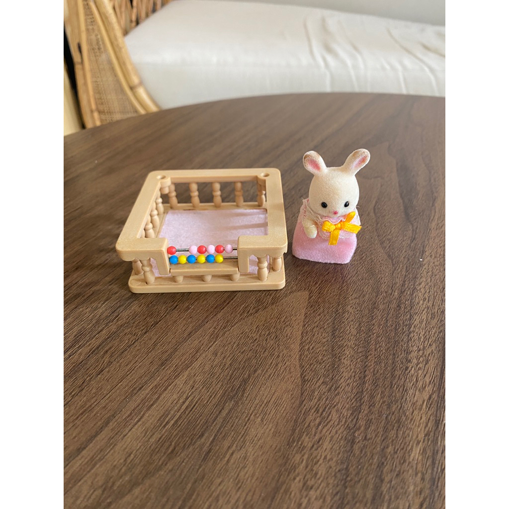 Sylvanian families chocolate rabbit baby standing with playpen