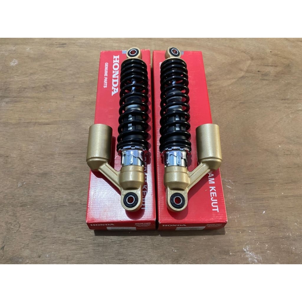 52400 KCJ 671 Shock skok belakang tiger revo tirev original baru ahm