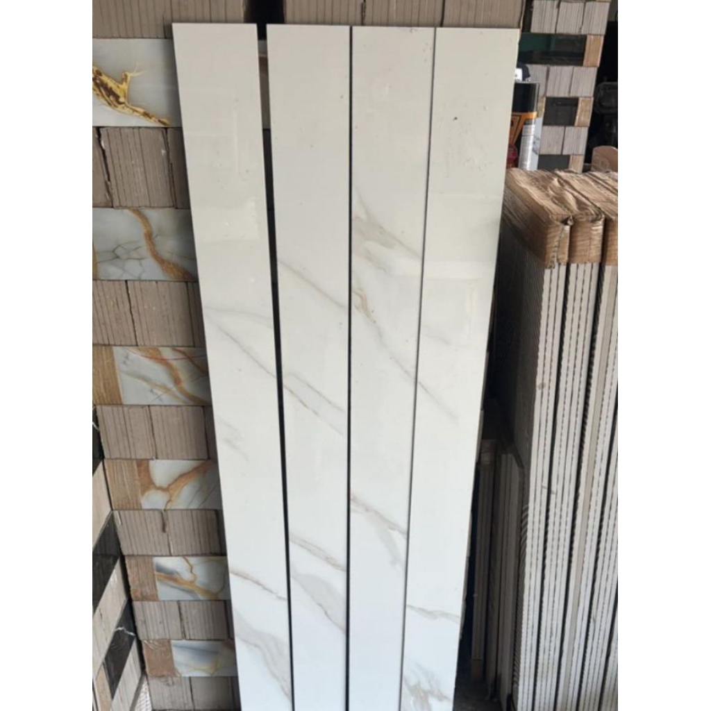 granit lantai Lis plin motif Carara 10x80