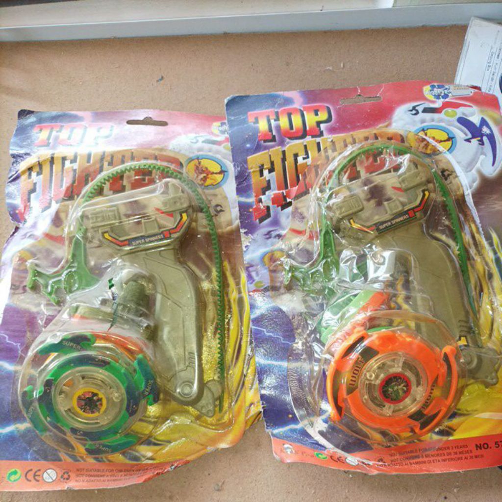 mainan gasing beyblade jadul press tengah besi dapet 2