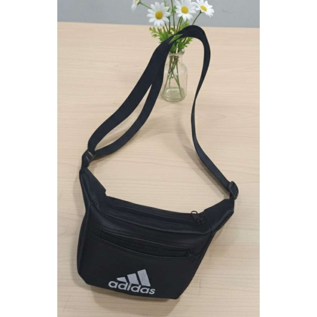 tas selempang pria dan wanita,dilengkapi 3 ruang resleting