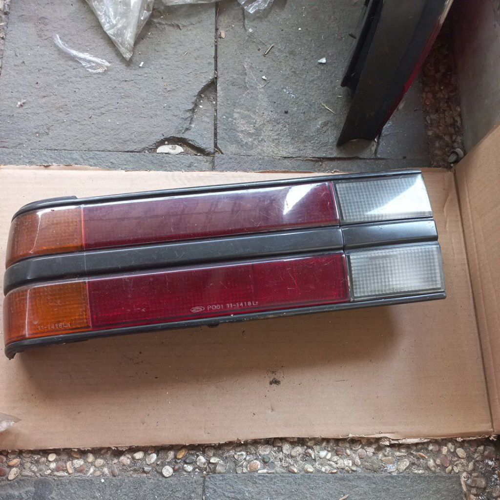 LAMPU BELAKANG STOPLAMP FORD LASER ORIGINAL