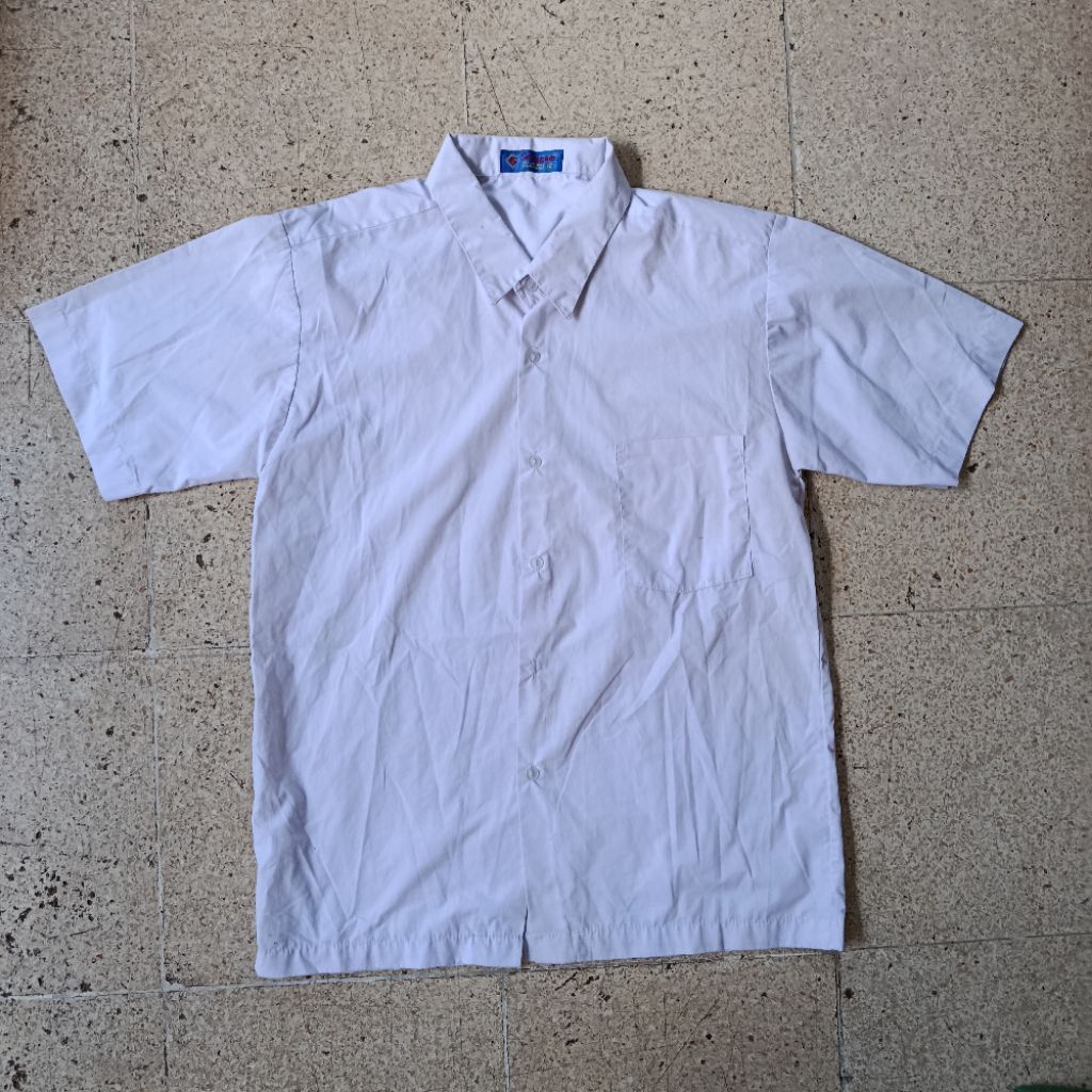 PL baju sekolah putih merk seragam / strike 45