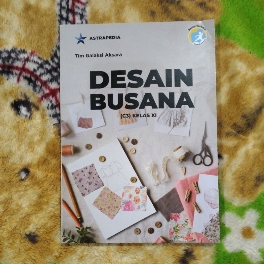 BUKU DESAIN BUSANA C3 KELAS 11