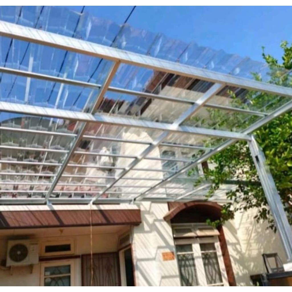 Kanopi Rangka baja ringan dengan atap spandek transparan