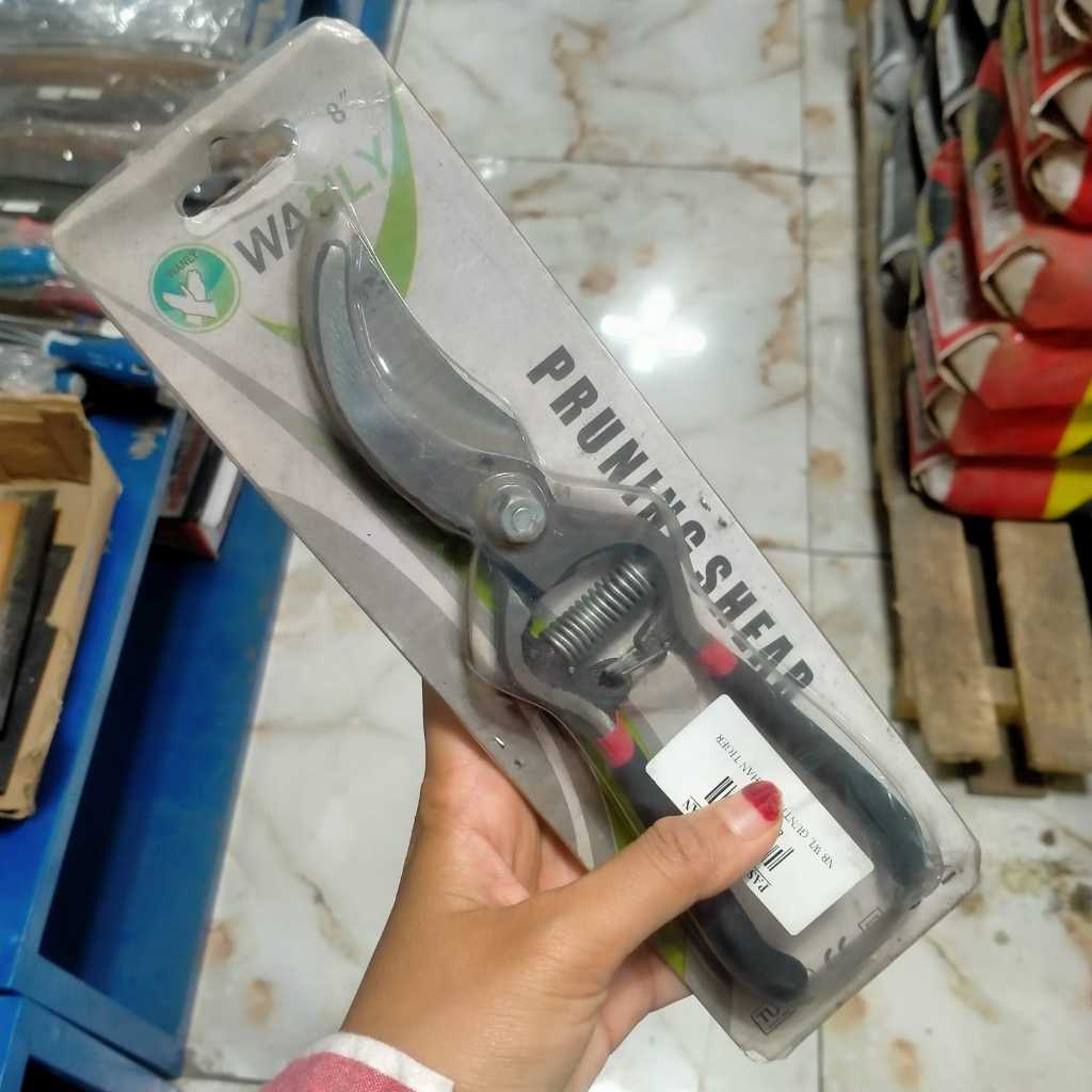 GUNTING DAHAN MERK TIGER