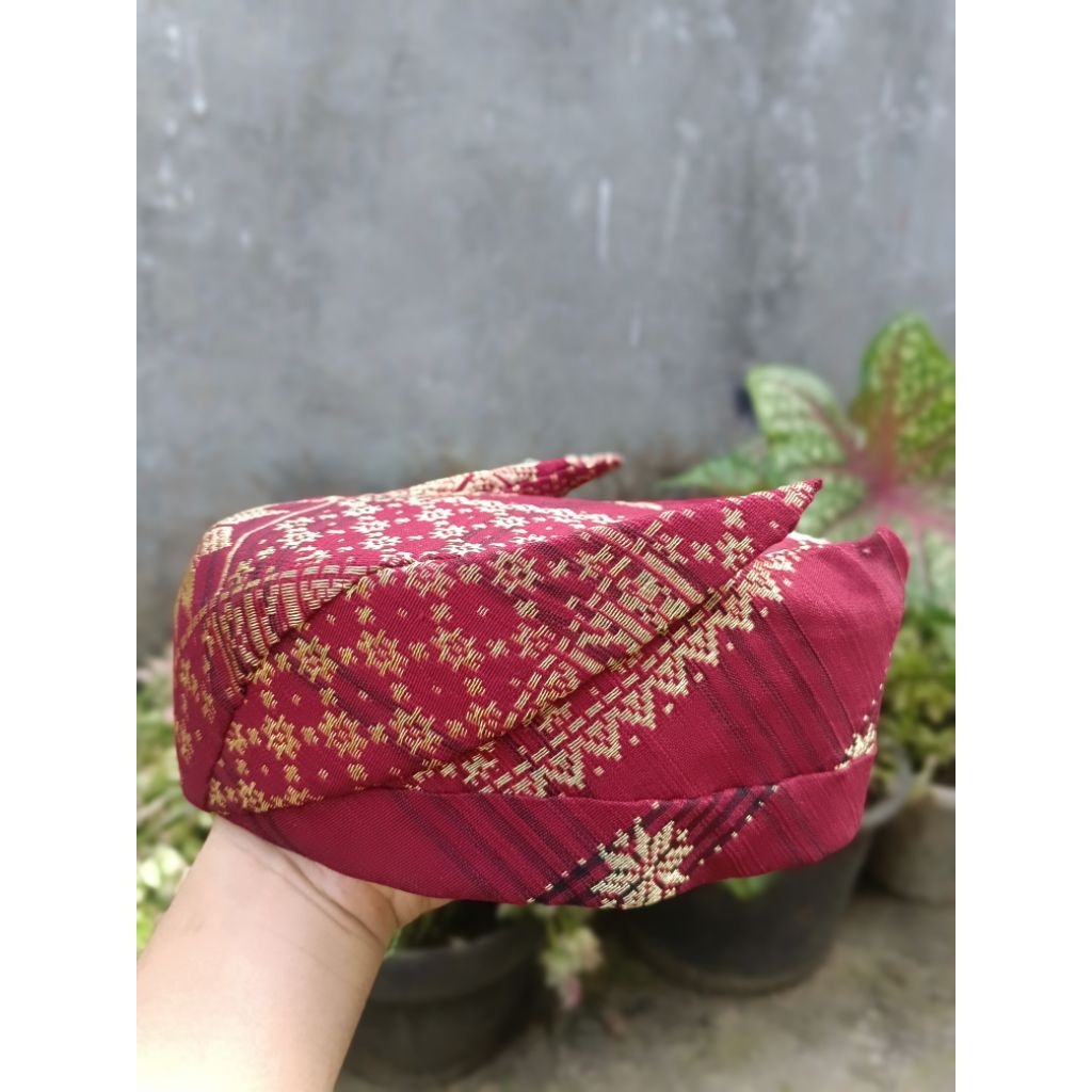 kikat kepudang peci adat lampung