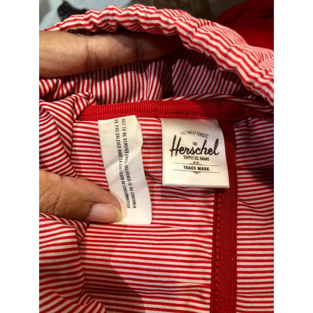 Tas Ransel Hershel Hitam Dalam Stripe Merah Preloved