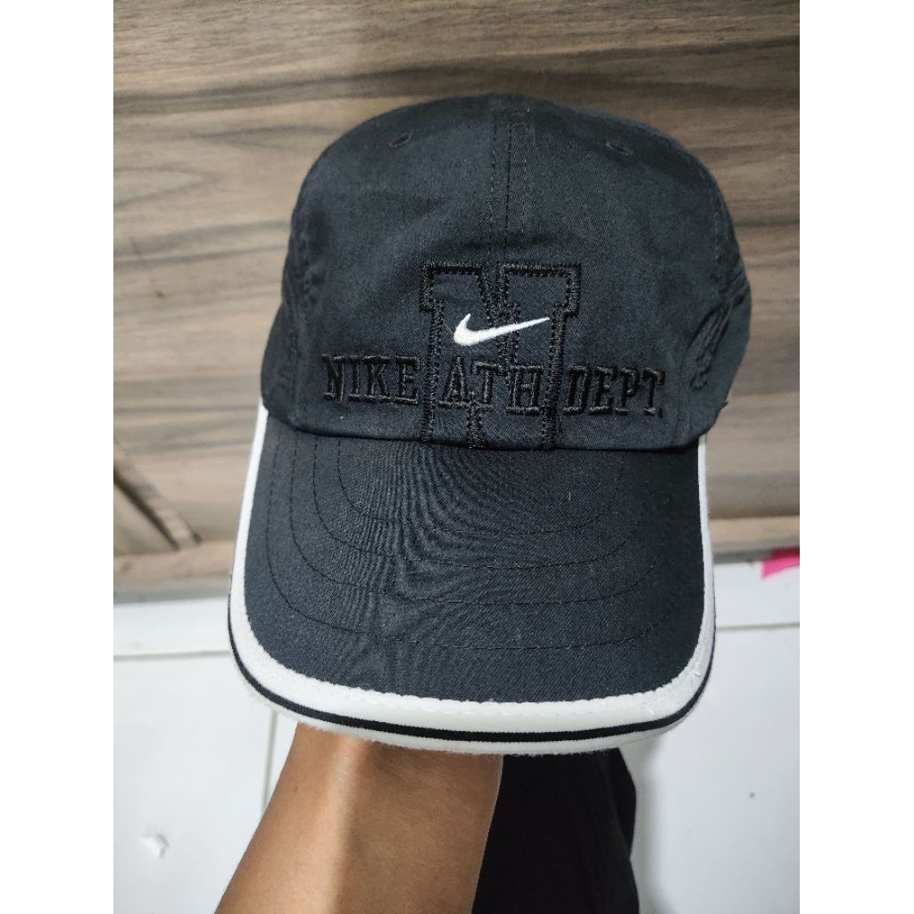 Topi running model lawas Nike*