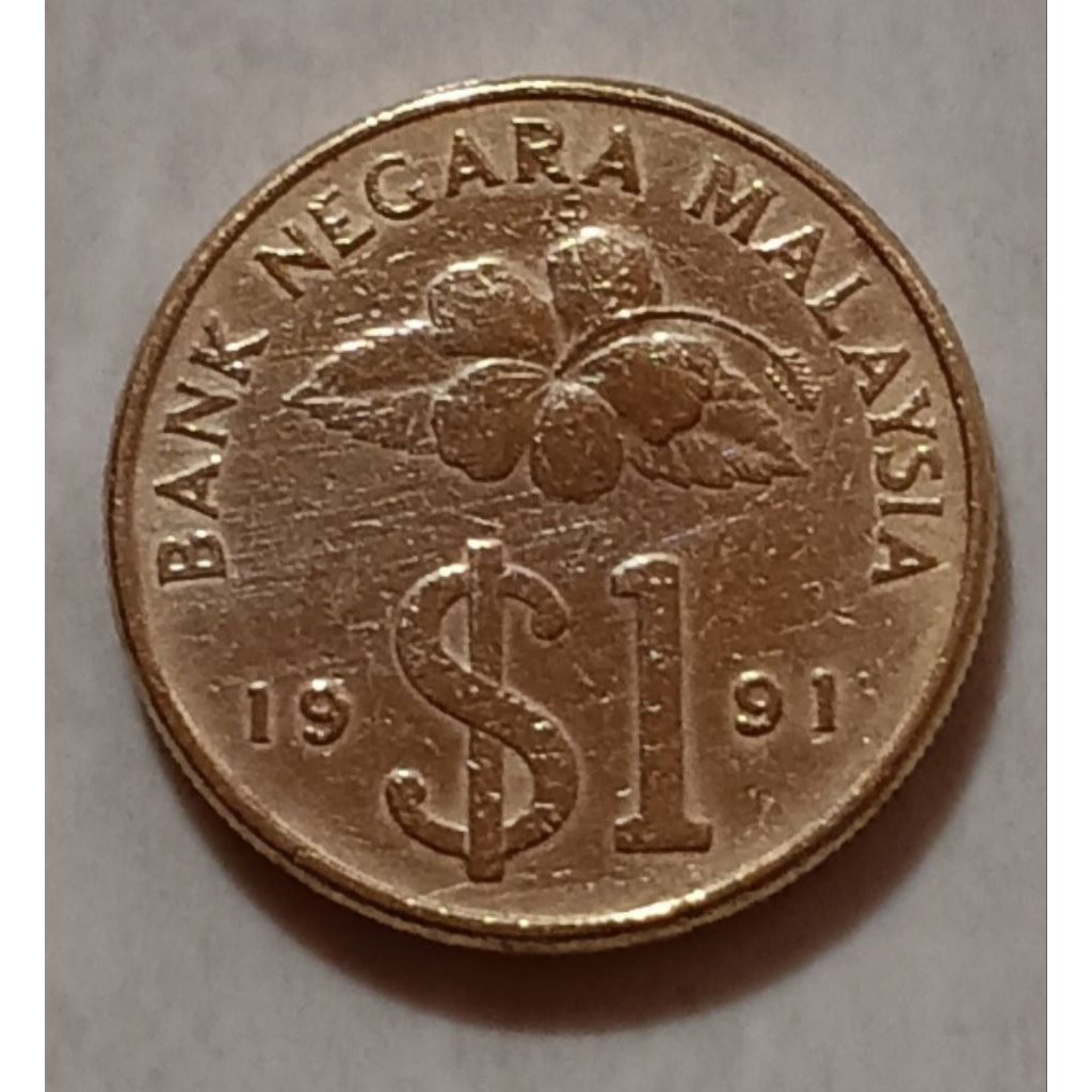 koin Malaysia 1 dollar ( gambar keris) tahun 1991..
