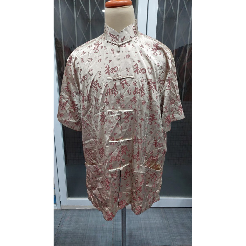 Kemeja cheongsam pria gold krem tulisan coklat