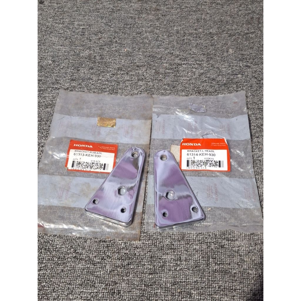 stay breket dudukan headlamp lampu depan Honda megapro MP hiu original ahm honda 61313 61314-keh-930