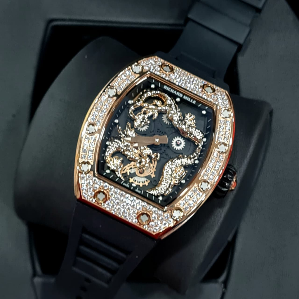 jam RM 057 Tourbillon Dragon-Jackie Chan watch with a rose gold case and a black rubber strap automa