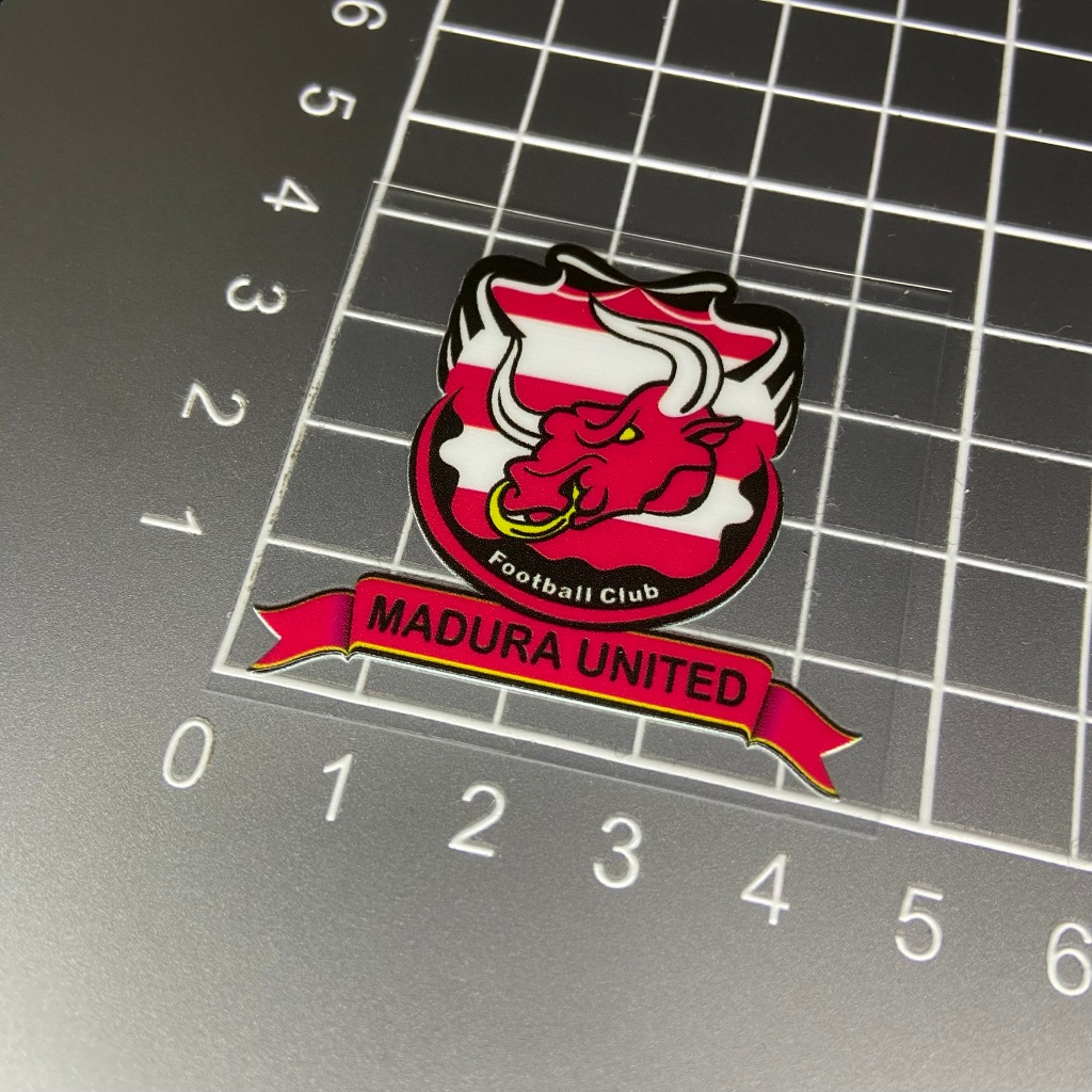 Sticker UV DTF – Madura United | Ukuran 4 x 4.5 cm | Ready Stock | Anti Air