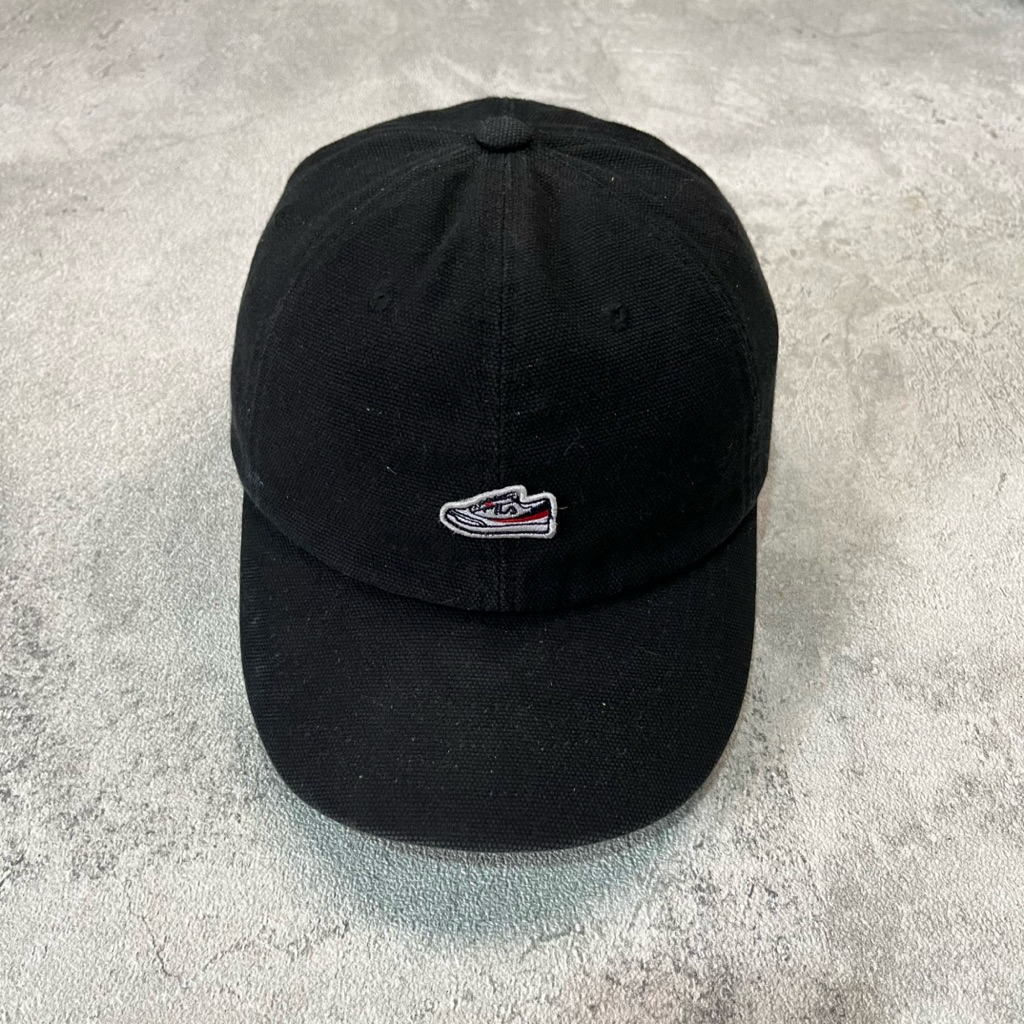 topi Fila logo sepatu